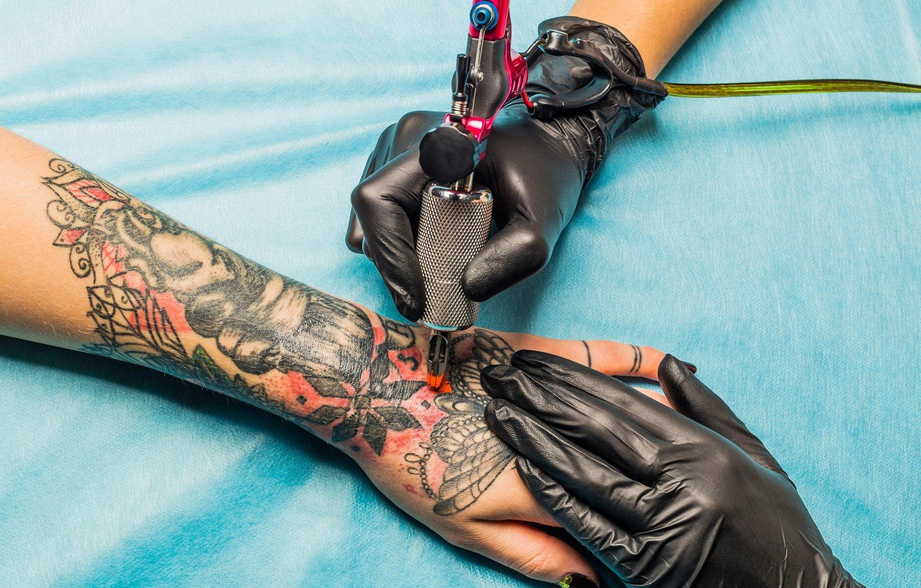 Machine Arm Tattoo