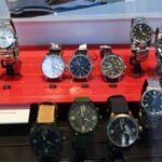 Tissot Seastar and Tissot PRX watches side-by-side, showcasing their distinct designs and features for comparison.